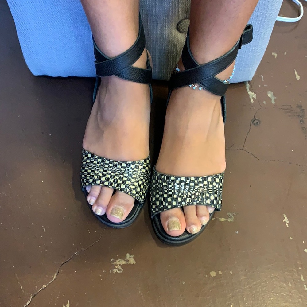 Wedge sandals by brand Arche.